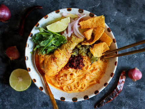 Khao soi gai, creamy noodle soup with chicken. Authentic northern Thai food.
