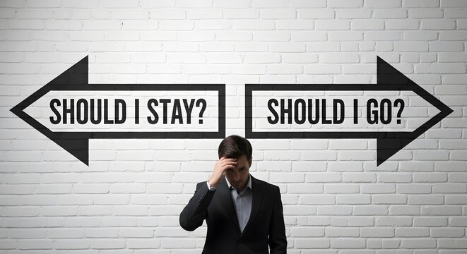 Man in suit looking stressed at signs pointing left 'Should I stay?' and right 'Should I go?' on brick wall