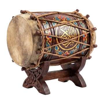 Miniature decorative Islamic bedug drum with rope ties, floral patterns, and Arabic calligraphy isolated on white