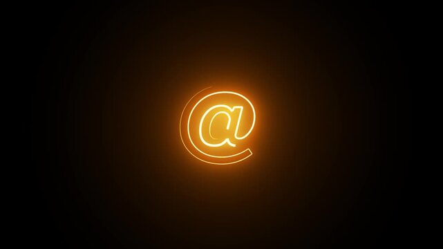Golden @, at symbol on black background.