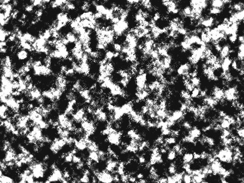 Abstract black and white background featuring a high contrast grainy texture with organic scattered spots creating a modern artistic monochrome pattern design