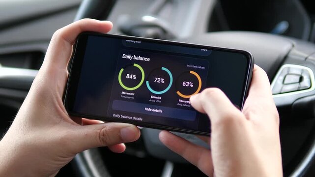 User reviews 10,000 daily steps and detailed fitness metrics on a smartphone, highlighting active living, self-tracking and growing interest in preventive health.