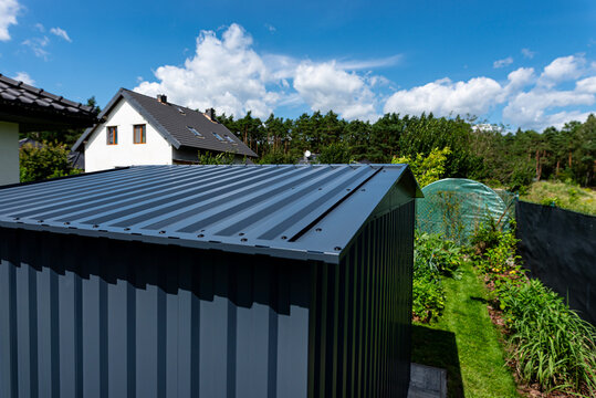 Modern metal corrugated shed roof and wall