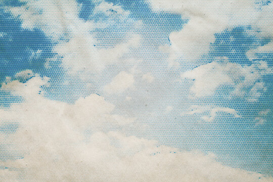 Serene Old Paper Sky with Clouds Texture