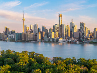 Fototapeta premium CN Tower and downtown Toronto glowing at sunrise