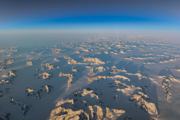 Greenland mountain range fading into polar horizon © Thomas