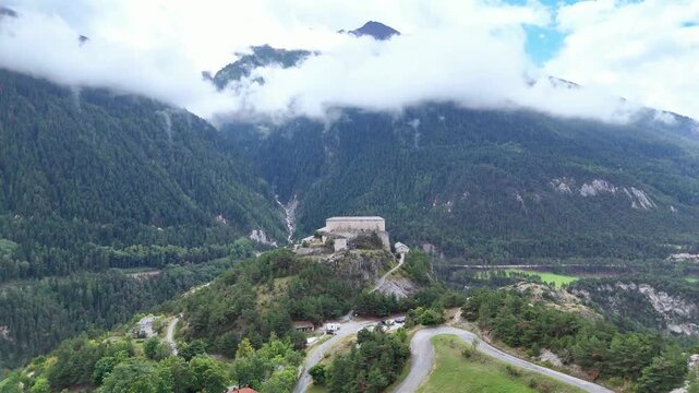 Fort Victor-Emmanuel in alpine valley landscape, Aussois, Savoie, Auvergne-Rhone-Alpes, France, Europe. Aerial view of Fort Victor-Emmanuel, Aussois, Savoie, Auvergne-Rhone-Alpes, France, Europe. 