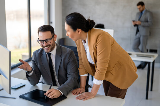 Multicultural business professionals in office, teamwork to achieve corporate success together