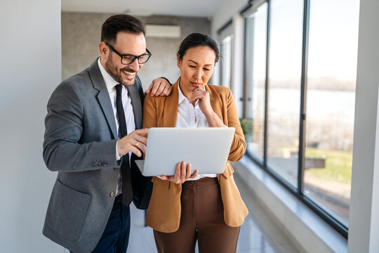 Multicultural business professionals in office, teamwork to achieve corporate success together