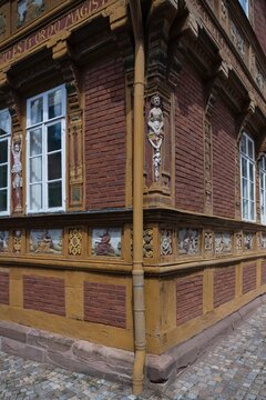 Scenes and buildings at the historic old town of Alfeld Germany. Decorative woodcarving.