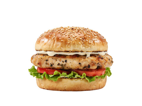 A delicious grilled chicken breast burger with fresh lettuce and sliced tomatoes