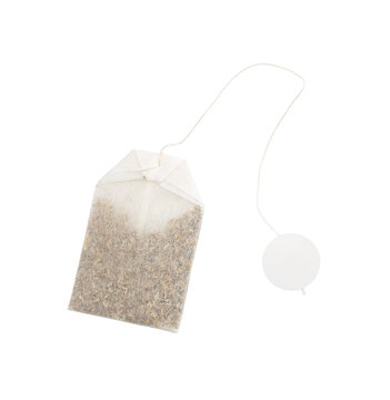 Blank tea bag with string and circular white paper tag mockup isolated on white background