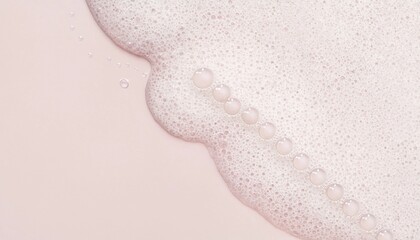 Fototapeta premium Soft pink cosmetic foam texture with bubbly soap lather background