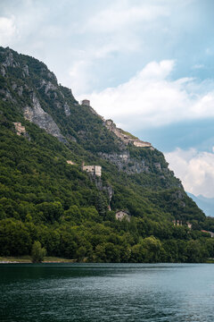 Historic Rocca d'Anfo fortress on a mountain slope  of  Monte Censo above Lago d'Idro ideal for travel and historic content