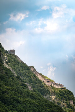 Historic Rocca d'Anfo fortress on a mountain slope  of  Monte Censo above Lago d'Idro ideal for travel and historic content