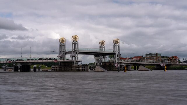 Timelapse clip of the Stadsbrug in Kampen, Netherlands, opening for a passage for 2 ships. The bridge is built in 1999 and is spanning the Ijssel River