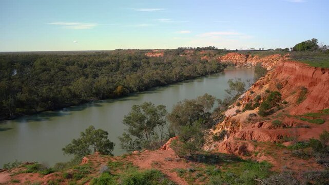 Murray River landscape red cliffs and clifftops, Australian nature and environmental conservation. This wide shot captures the unique geology and bushland