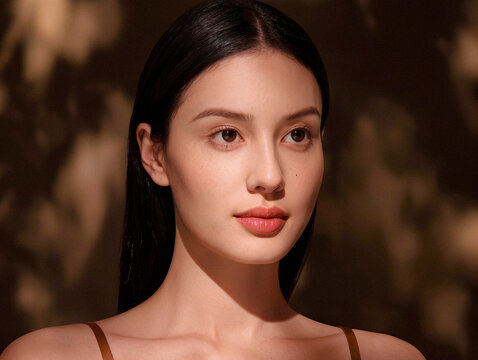 Portrait of a Young Woman Posing Against Dark Background. AI generated
