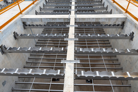 High angle view of high-rate lamella clarifier modules with v-notch stainless steel weirs at water treatment plant