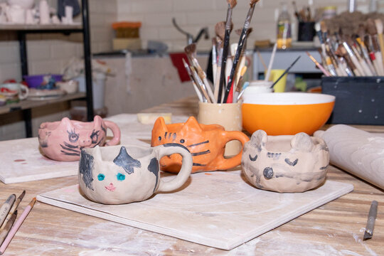 clay and ceramics studio, children's clay creations, handmade items, sculpting lessons for children, decorating clay pieces with engobes, ceramics workshop