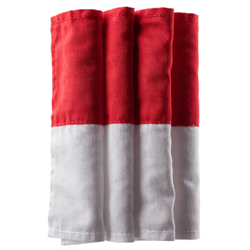 Close up of folded Indonesian red and white flag fabric texture