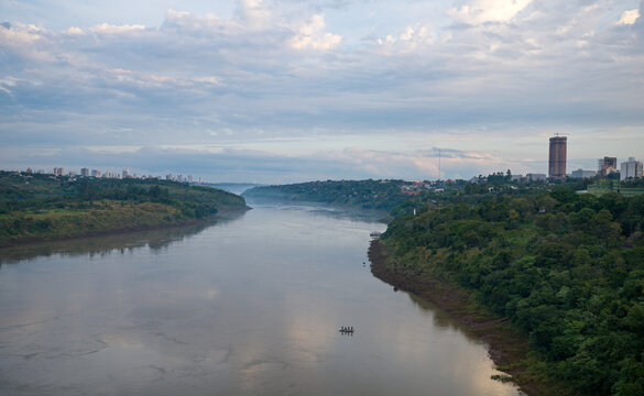 A Small Boat Crosses the Paran&aacute; River Between Foz do Igua&ccedil;u and Ciudad del Este