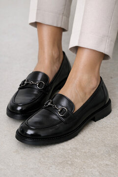 Feet with loafer shoes