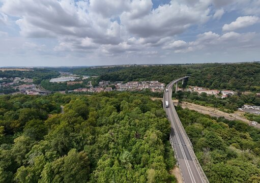 Vue a&eacute;rienne panoramique du Pays-Haut, villages de Rehon, Mexy, viaduc de la Chiers, route nationale 52, au fond la ville de Longwy et les fronti&egrave;res Belge et Luxembourgeoise. Ciel nuageux juillet 206