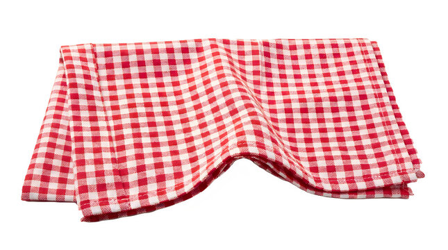 Folded red and white checkered picnic napkin isolated on transparent background textile kitchen cloth table cover fabric pattern material for dining food serving lunch concept.