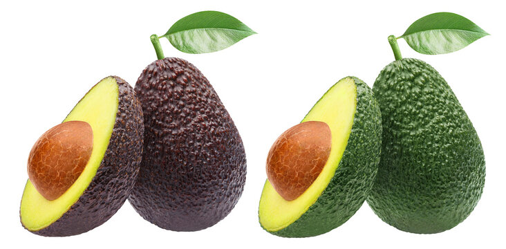 Set of whole and halved green and black avocados with leaves, isolated on transparent cutout background
