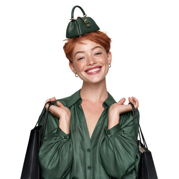 Smiling red-haired freckled woman with a tiny green handbag on her head holding shopping bags against isolated on transparent or white background, png