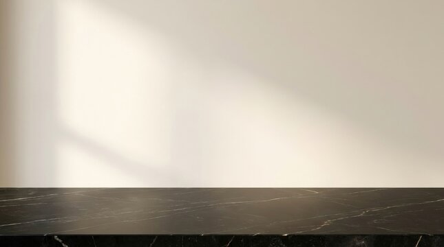 Black marble countertop against a plain ivory wall background