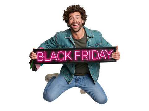 Excited curly-haired man in a denim jacket jumping and holding a pink neon Black Friday sign against isolated on transparent or white background, png