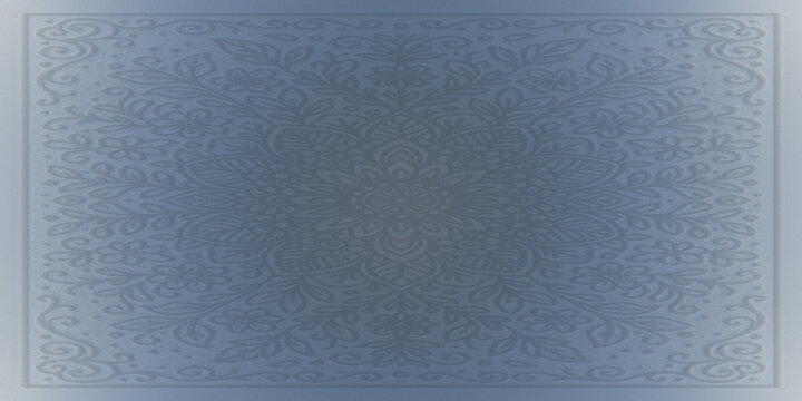 Symmetrical mandala pattern etched on smooth textured surface with soft blue gradient.