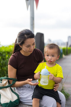 Mother and son in outdoor park
