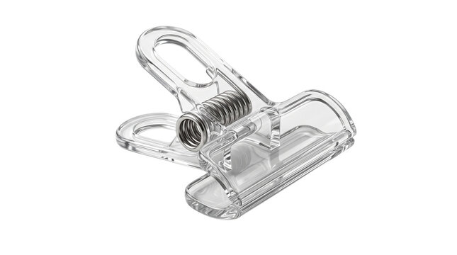 Clamp made of transparent plastic material holds papers firmly in a professional office environment setting.
