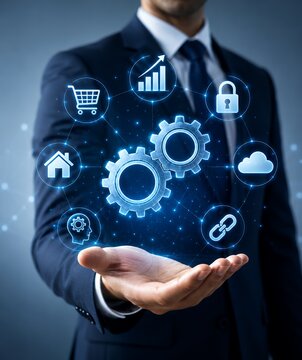 Man presents interlocking gears surrounded by digital icons representing various business functions.