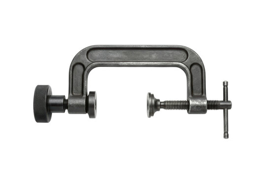 Metal C-clamp on white background