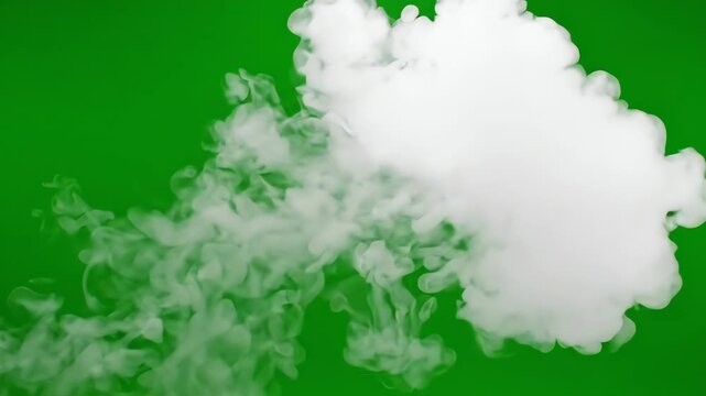 Dense white steam clouds drifting across a vibrant green screen surface for visual effects composting