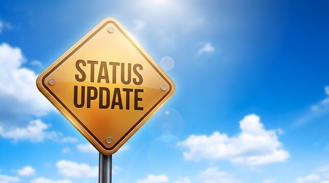 Yellow highway road sign displaying status update message against blue sky representing project progress communication