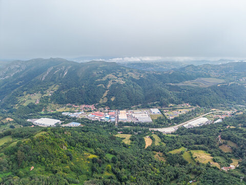 Asturian mountain landscape and industrial zone view from drone