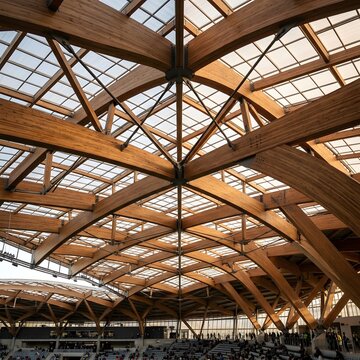 Modern glulam wooden roof structure of a large sports stadium interior