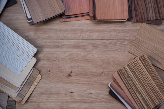 Variety of Natural Wood Grain Samples on Table for Creative Furniture Design and Woodworking