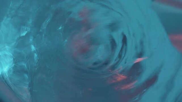 Reagent dissolving in liquid vortex from magnetic stirrer, top down view