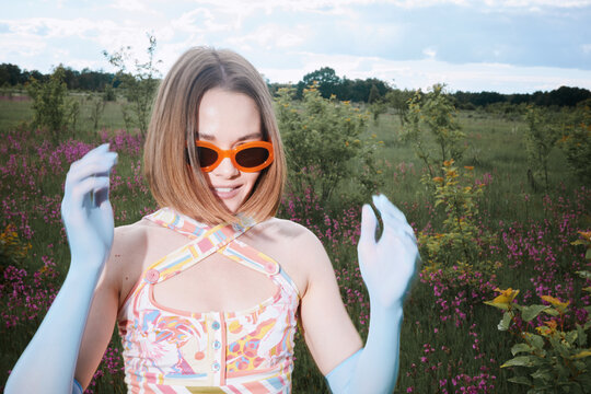 Colorful summer portrait of Woman in Orange Sunglasses