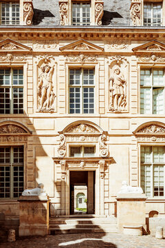History is Shown in Stone on the Building in the Background