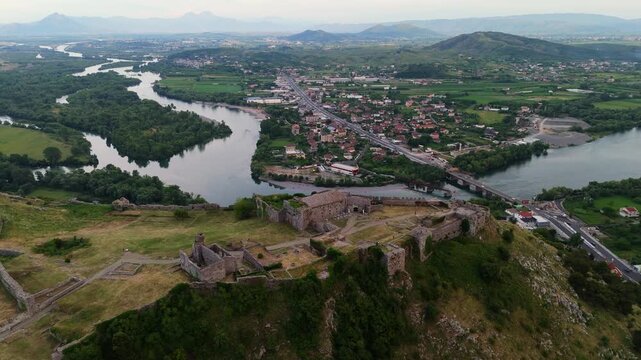 Aerial Drone View of Rozafa Castle in Shkoder Albania Overlooking the Buna and Drin Rivers, Historic Fortress Ruins and Surrounding Countryside