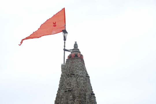 Majestic shikhara of Dwarkadhish Temple with religious flag in Dwarka, Gujarat