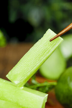 Fresh Green Celery Stick with Wooden Chopsticks - Healthy Vegetable Food Ingredient
