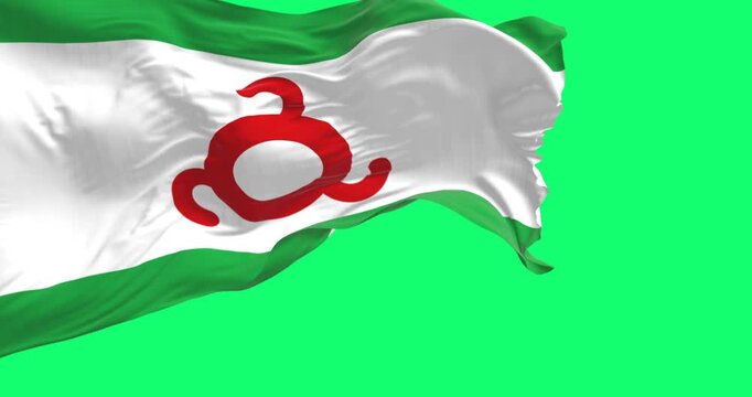 Ingushetia flag waving in the wind isolated on green background